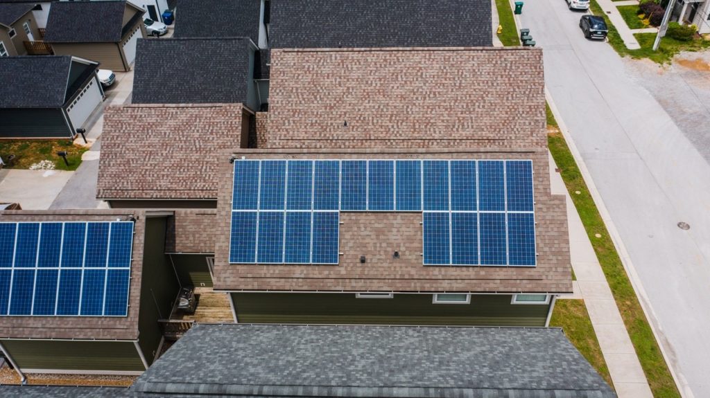 Aerial view of new solar panels on a residential home in California.