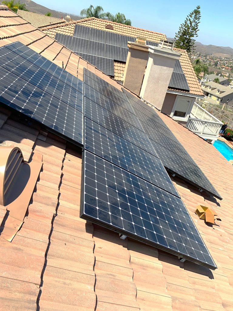 A few rows of solar panels on the roof of a home in Lake Elsinore