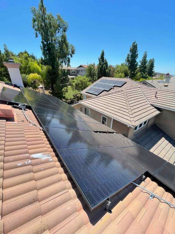A few sections of solar panels on the roof of some homes in Rancho Santa Margarita
