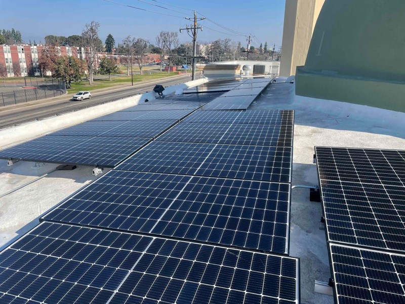 New solar panels on the roof of a nonprofit building in Fresno, California.